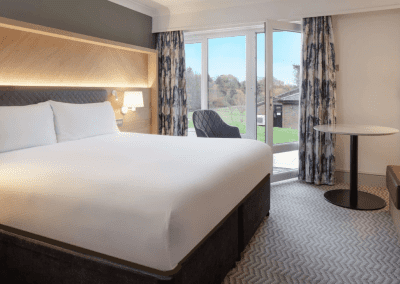 Hotel interior of Hilton Hotels, featuring contract hotel furniture and bespoke headboards to create an inviting and relaxed guest experience.