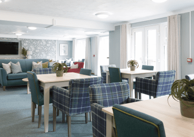 Interior of Orbit Homes Bushey Court featuring comfortable and supportive dining and lounge furniture for independent and retirement living.