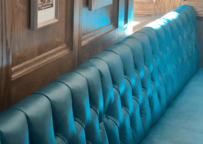 Interior of The Crown Bodedern featuring contract furniture and fixed seating for an elegant look, enhancing the character of this countryside gastropub.