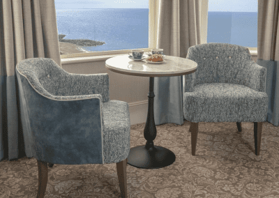 Bedroom interiors for a Victorian, seaside hotel featuring bespoke statement headboards, bedroom furniture and soft furnishings to complement the hotel’s aesthetic.