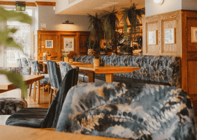 Interior of a restaurant featuring contract furniture and fixed seating for an elegant look, enhancing the character of this countryside gastropub.