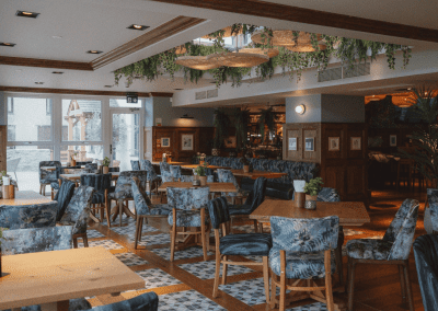 Interior of a restaurant featuring contract furniture and fixed seating for an elegant look, enhancing the character of this countryside gastropub.