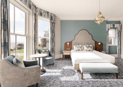 Bedroom interiors for a Victorian, seaside hotel featuring bespoke statement headboards, bedroom furniture and soft furnishings to complement the hotel’s aesthetic.
