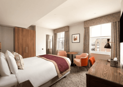 Bedroom interiors for a Victorian, seaside hotel featuring bespoke statement headboards, bedroom furniture and soft furnishings to complement the hotel’s aesthetic.
