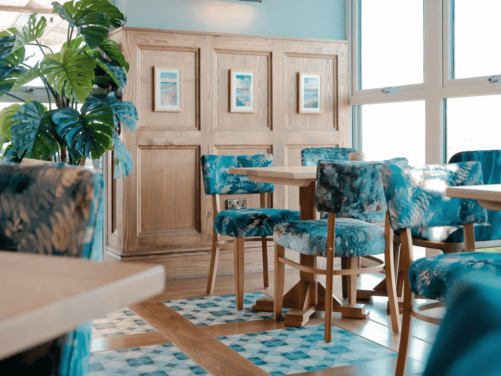 Interior of a restaurant featuring contract furniture and fixed seating for an elegant look, enhancing the character of this countryside gastropub.