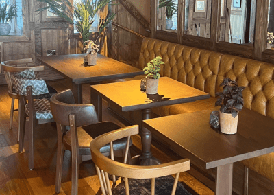 Interior of a restaurant featuring contract furniture and fixed seating for an elegant look, enhancing the character of this countryside gastropub.