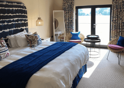 Interior of The Baraset Barn Hotel, Stratford-upon-Avon, featuring warm rustic textures, contract furniture and soft furnishings by Jameson Seating for a refined and relaxed guest experience.