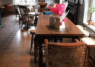 Pub interior of Mitchells and Butlers pubs, featuring contract furniture and bespoke curtains.