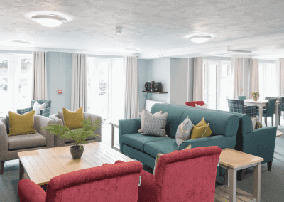 Interior of Orbit Homes Bushey Court featuring comfortable and supportive dining and lounge furniture for independent and retirement living.