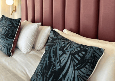 Bedroom interiors for Clifton Hotel, a Victorian, seaside hotel featuring bespoke statement headboards, bedroom furniture and soft furnishings to complement the hotel’s aesthetic.
