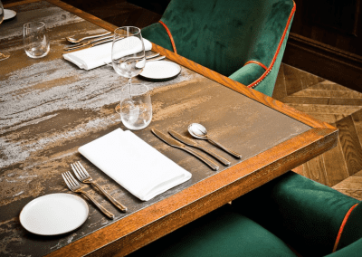 Interior of The Forest Hotel, a boutique hotel with sophisticated private dining room, featuring bespoke restaurant furniture with elegant detailing.