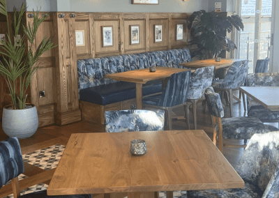 Interior of a restaurant featuring contract furniture and fixed seating for an elegant look, enhancing the character of this countryside gastropub.