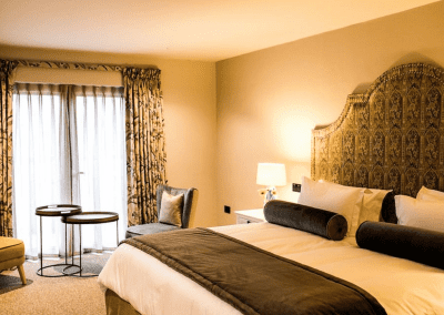 Interior of The Baraset Barn Hotel, Stratford-upon-Avon, featuring warm rustic textures, contract furniture and soft furnishings by Jameson Seating for a refined and relaxed guest experience.