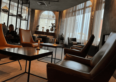 Bespoke wave voile curtains at Opheem Birmingham, enhancing the restaurant’s modern and elegant interior with tailored soft furnishings.