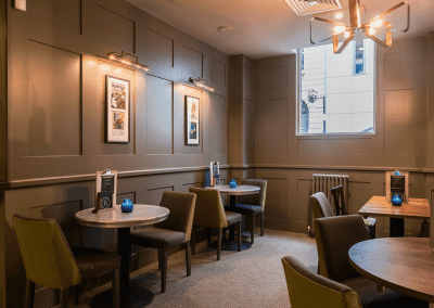 Pub interior of Bar Utopia, featuring contract furniture and bespoke fixed seating.