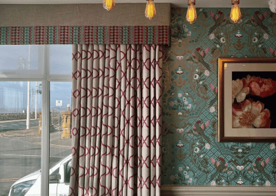 Interiors of Sheraton Hotel Blackpool featuring contract furniture, lounge seating, bedroom furniture, and bespoke curtains, pelmets, and blinds reflecting the hotel’s vibrant coastal design.