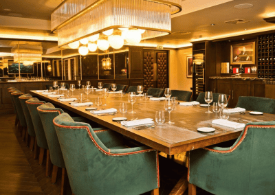 Interior of The Forest Hotel, a boutique hotel with sophisticated private dining room, featuring bespoke restaurant furniture with elegant detailing.
