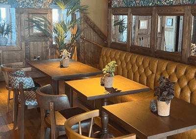 Interior of a restaurant featuring contract furniture and fixed seating for an elegant look, enhancing the character of this countryside gastropub.