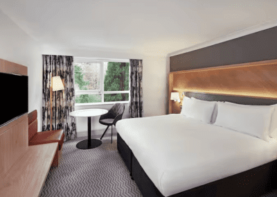 Hotel interior of Hilton Hotels, featuring contract hotel furniture and bespoke headboards to create an inviting and relaxed guest experience.