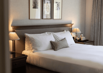Hotel interior of DoubleTree Hilton Cheltenham, featuring contract hotel furniture and bespoke headboards to create an inviting and relaxed guest experience.