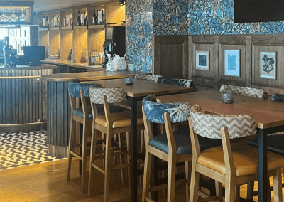 Interior of a restaurant featuring contract furniture and fixed seating for an elegant look, enhancing the character of this countryside gastropub.
