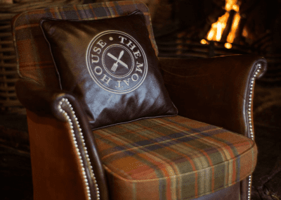 Interior of The Moat House featuring bespoke pub furniture including dining chairs, bar stools, and tables to enhance the vibrant yet traditional charm of the pub.