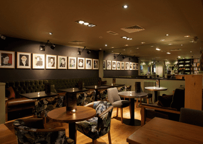 Pub interior featuring contract furniture and bespoke fixed seating.