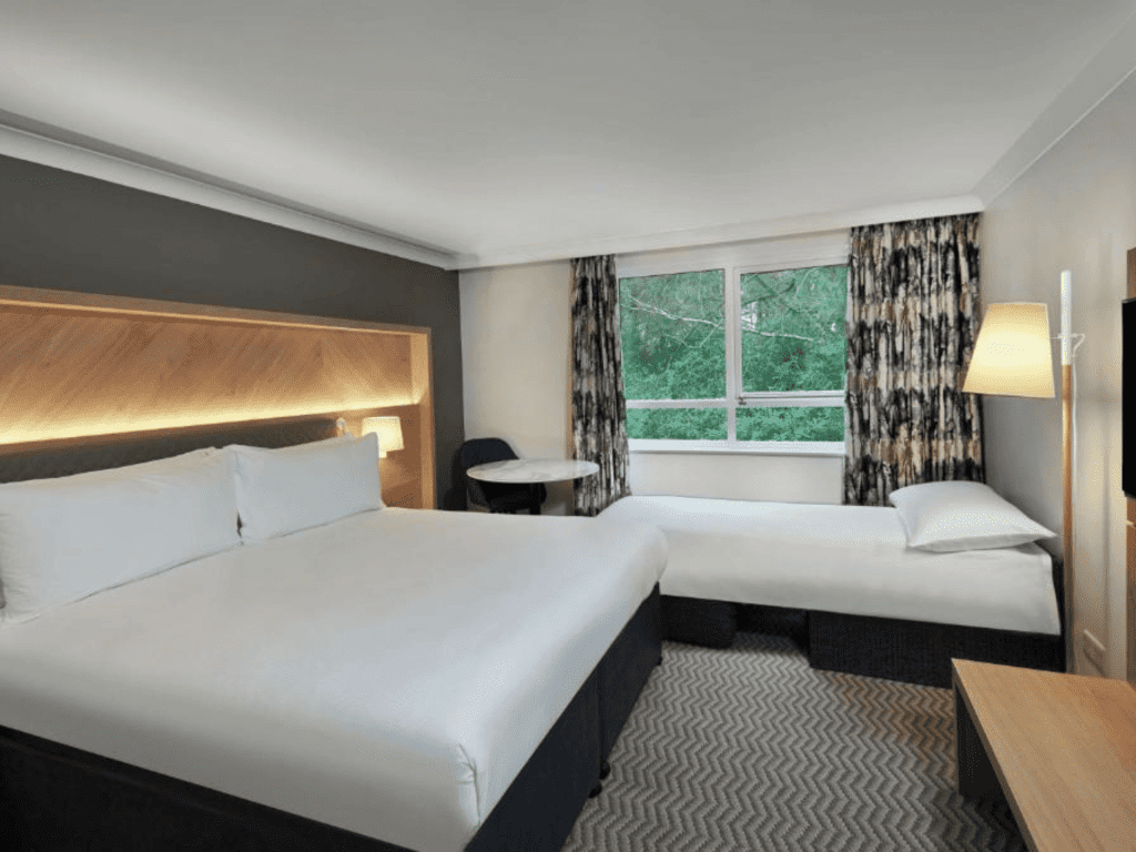 Hotel interior featuring contract hotel furniture and bespoke headboards to create an inviting and relaxed guest experience.