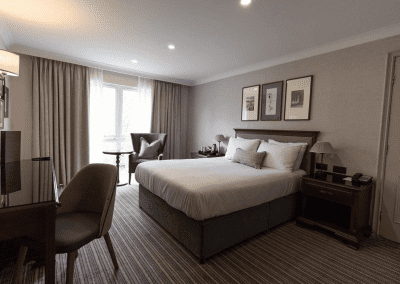 Hotel interior featuring contract hotel furniture and bespoke headboards to create an inviting and relaxed guest experience.