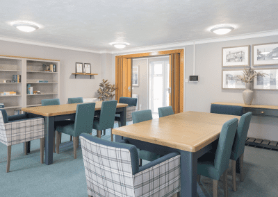 Interior of a retirement home featuring comfortable and supportive dining and lounge furniture for independent and retirement living.