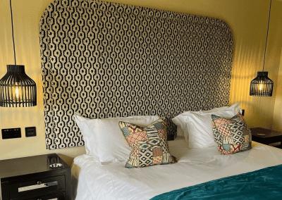 Interior of a barn hotel, featuring warm rustic textures, contract furniture and soft furnishings by Jameson Seating for a refined and relaxed guest experience.