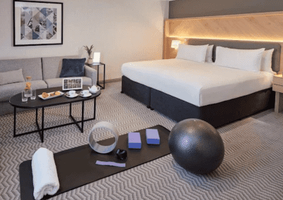 Hotel interior featuring contract hotel furniture and bespoke headboards to create an inviting and relaxed guest experience.