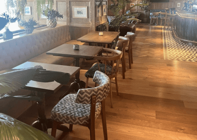 Interior of a restaurant featuring contract furniture and fixed seating for an elegant look, enhancing the character of this countryside gastropub.