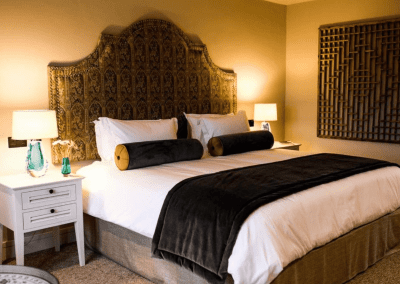 Interior of a barn hotel, featuring warm rustic textures, contract furniture and soft furnishings by Jameson Seating for a refined and relaxed guest experience.