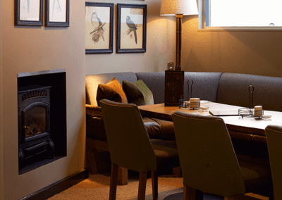 Pub interior featuring contract furniture and bespoke fixed seating.