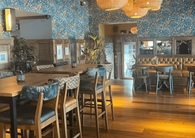 Interior of a restaurant featuring contract furniture and fixed seating for an elegant look, enhancing the character of this countryside gastropub.