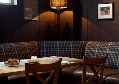 Pub interior featuring contract furniture and bespoke fixed seating.