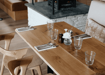 Interior of a country-style pub featuring contract furniture and soft furnishings, blending heritage charm with contemporary comfort.