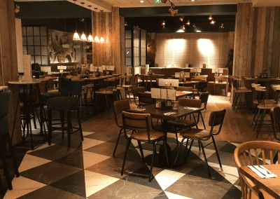 Bespoke furniture and refurbished & reupholstered furniture for an airport restaurant and lounge with a stylish and modern interior.