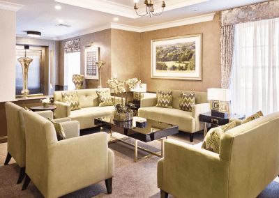 Interior picture of Signature at Hendon Hall care home, featuring calming and comfortable furniture in a range of rooms, to support senior living.