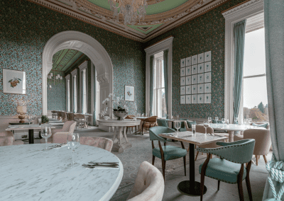 Elegant soft furnishings, featuring bespoke curtains and accent pieces, blending period charm with refined comfort.