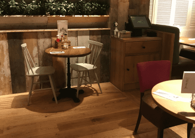 Bespoke furniture and refurbished & reupholstered furniture for an airport restaurant and lounge with a stylish and modern interior.