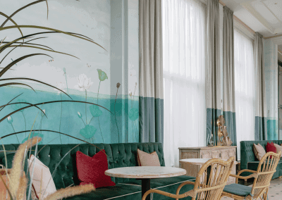 Elegant soft furnishings, featuring bespoke curtains and accent pieces, blending period charm with refined comfort.