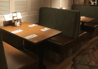 Bespoke furniture and refurbished & reupholstered furniture for an airport restaurant and lounge with a stylish and modern interior.