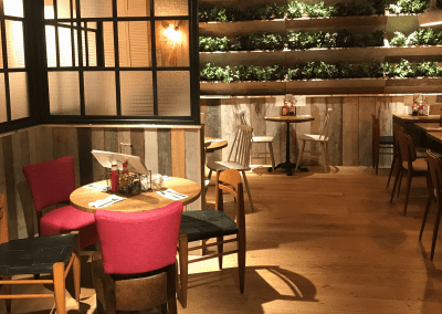Bespoke furniture and refurbished & reupholstered furniture for an airport restaurant and lounge with a stylish and modern interior.