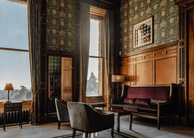 Elegant soft furnishings, featuring bespoke curtains and accent pieces, blending period charm with refined comfort.