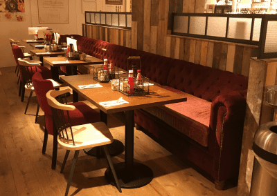 Bespoke furniture and refurbished & reupholstered furniture for an airport restaurant and lounge with a stylish and modern interior.