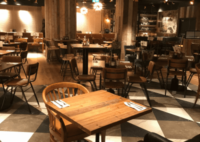 Bespoke furniture and refurbished & reupholstered furniture for an airport restaurant and lounge with a stylish and modern interior.
