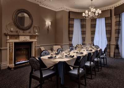 Interior picture of Signature at Hendon Hall care home, featuring calming and comfortable furniture in a range of rooms, to support senior living.
