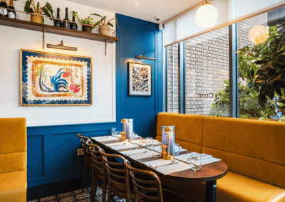 Bespoke café curtains, cushions, and soft furnishings, combining Parisian charm with durable, stylish design.